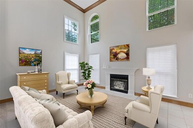 Soaring 2-story ceilings in this impressive living