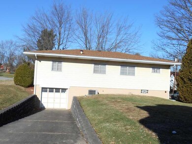 Exterior Back. Integral garage