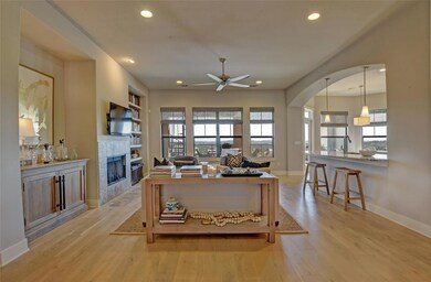 Office with recessed lighting, ceiling fan, light