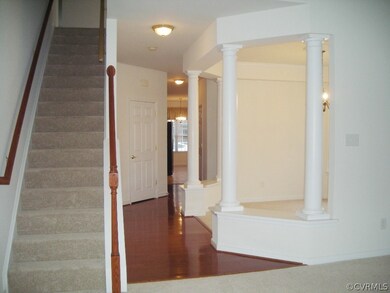 View of stairs to the 2nd level and dining room to the right and eat-in kitchen ahead