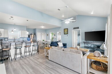 Spacious living area with vaulted ceilings