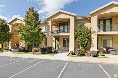 View of property with uncovered parking