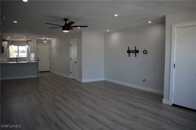 Spare room with recessed lighting, wood finished f