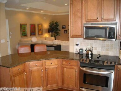 Breakfast. Kitchen breakfast bar overlooks the living room area.