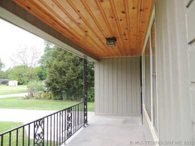 The front porch has fresh paint, new fixture and b