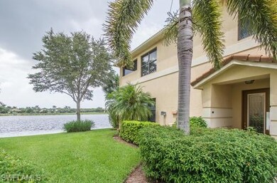 Side entry with expansive Lake and Golf Course vie