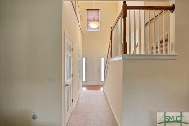 The hallway from living room to foyer.