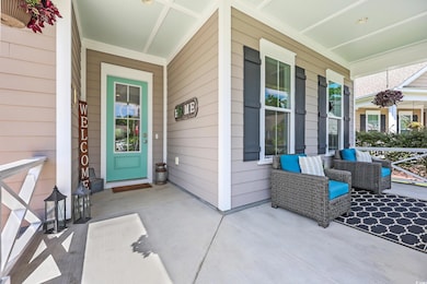Property entrance with covered porch