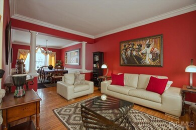 Formal living room, crown moldings and columns