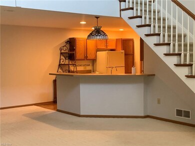 View of kitchen and restroom.
