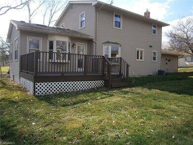 Deck is located off family room.
