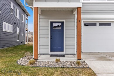 Covered entry + 2 car garage.