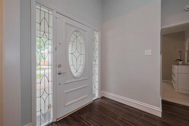 Step onto the welcoming front porch and through yo