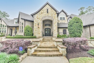 Elegant entrance! Beautifully maintained! Stucco, Stone and Brick exterior! Energy saving Spray foam insulation! hot water on Demand- 2 Heat-pump water heaters!