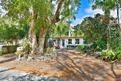 Old growth trees with low-maintenance yard.