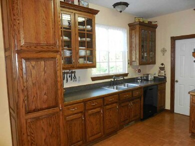 Kitchen. Oak Cabinet with glass doors