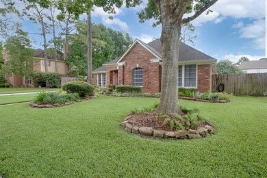 Beautifully landscaped front yard with stone accents provides beautiful curb appeal.