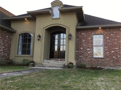 Window to the left of the front door is the formal
