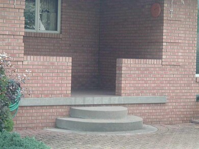 Exterior Back. REAR PORCH AND PATIO ENTRANCE. DOOR