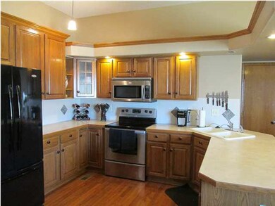 Second view of kitchen has stainless steel applian