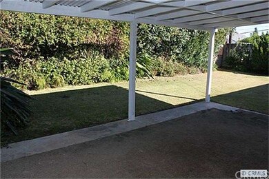 Spacious Back Yard with Covered Patio.