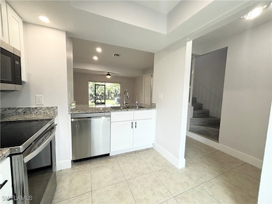 Kitchen with appliances with stainless steel finis