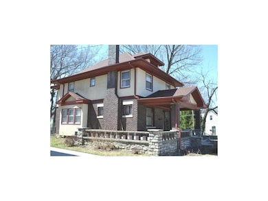 East Side of the House. Brick, Stone, Stucco.
