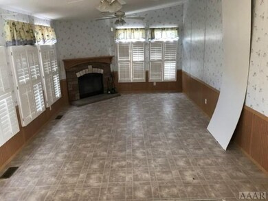 Den with fireplace