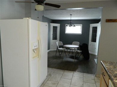 View from Kitchen into Formal Dining Room w/built-
