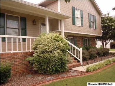 CLOSE-UP OF THIS GREAT HOME! LARGE COVERED PORCH-PERFECT FOR ENJOYING THE BEAUTIFUL YARD. OUTSIDE HAS BEEN FRESHLY PAINTED AND BOASTS A GREAT STORM DOOR AND NEW FRONT DOOR.