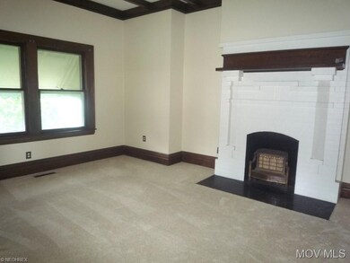 Living Room w/Beamed Ceiling