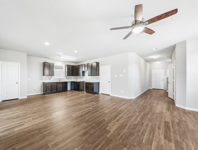 : Image depicts a model home of a similar layout to the home available for purchase.