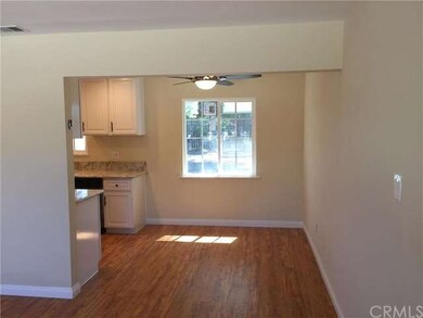 Front view of the dining area, leading to the kitc