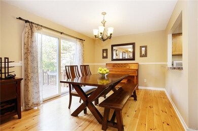 Dining area has a sliding door to private deck