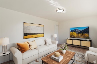 Living room featuring wood finished floors