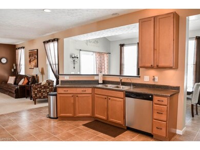 The kitchen opens to the great room and morning ro