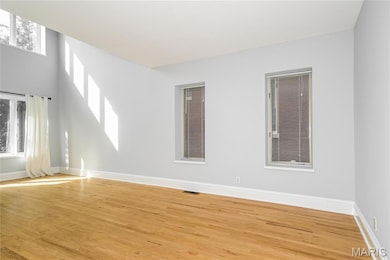 Unfurnished room featuring light wood finished floors