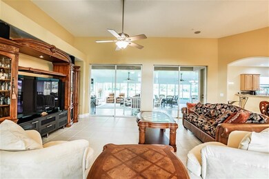 Open floorplan with high ceilings and neutral colo