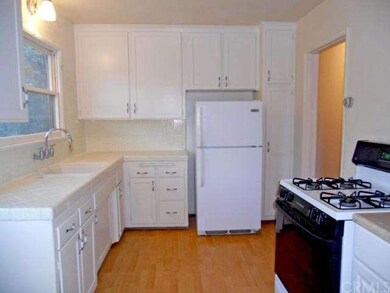 Lovely kitchen with tiled counter tops, new gas st