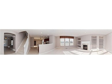 Family Room. Family room with built in shelves, plenty of windows, gas fireplace, open to kitchen