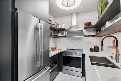 The Modern Kitchen is Equipped with Sleek Stainles