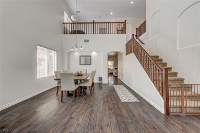 Living room and dining area. Loft upstairs.