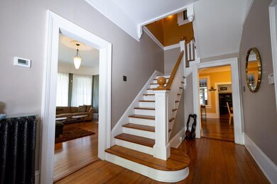 Foyer with wooden staircase