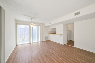 This inviting open-concept living space is filled