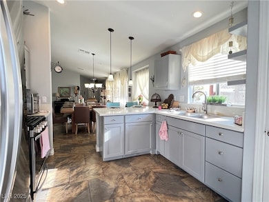Kitchen with appliances with stainless steel finis