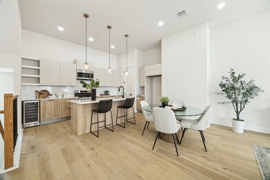 Modern kitchen with sleek cabinetry, stainless ste