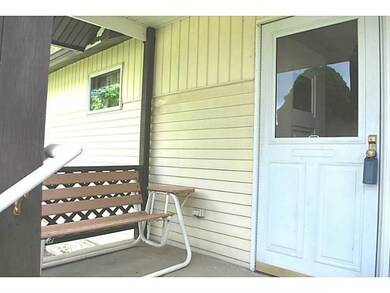 Exterior Front. Room for a bench to relax and enjo