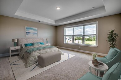 Carpeted bedroom featuring ornamental molding, a r