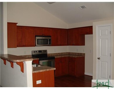 Kitchen. Dine-in kitchen has breakfast bar, pantry
