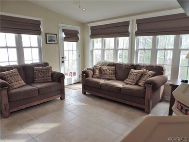 This warm and inviting all season room gleams with